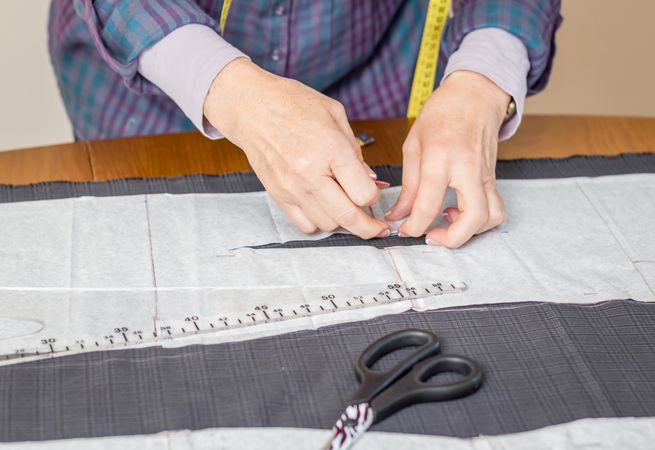 Dressmaker design tailor pattern on the table