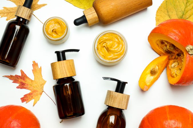 Skin care and face care concept - pumpkin cosmetic