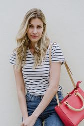 Lovely shy woman looking at camera