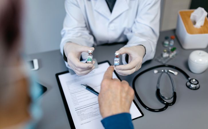 Patient choosing one of the coronavirus vaccines offered by her doctor