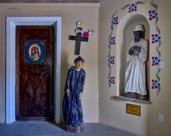 Scene inside the Prayer Portal, adjacent to the Santo Niño de Atocha Chapel, Chimayó, New Mexico bxvny5