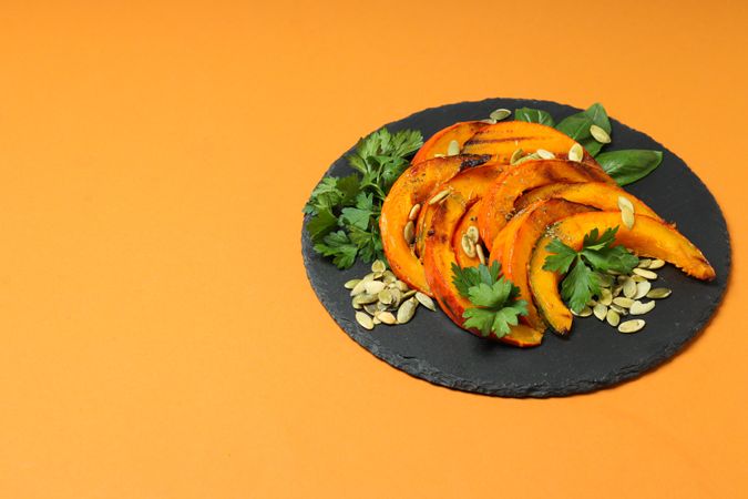 Concept of tasty homemade dish - baked pumpkin