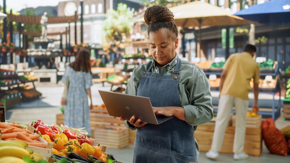 Black Female Managing Business Operations and Communications with Suppliers