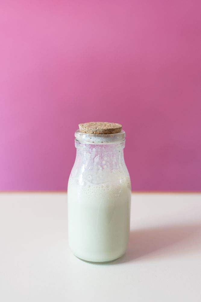 Close up of a milk jar for making rolled ice cream