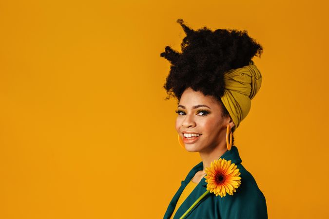 Portrait of smiling Black woman in head wrap