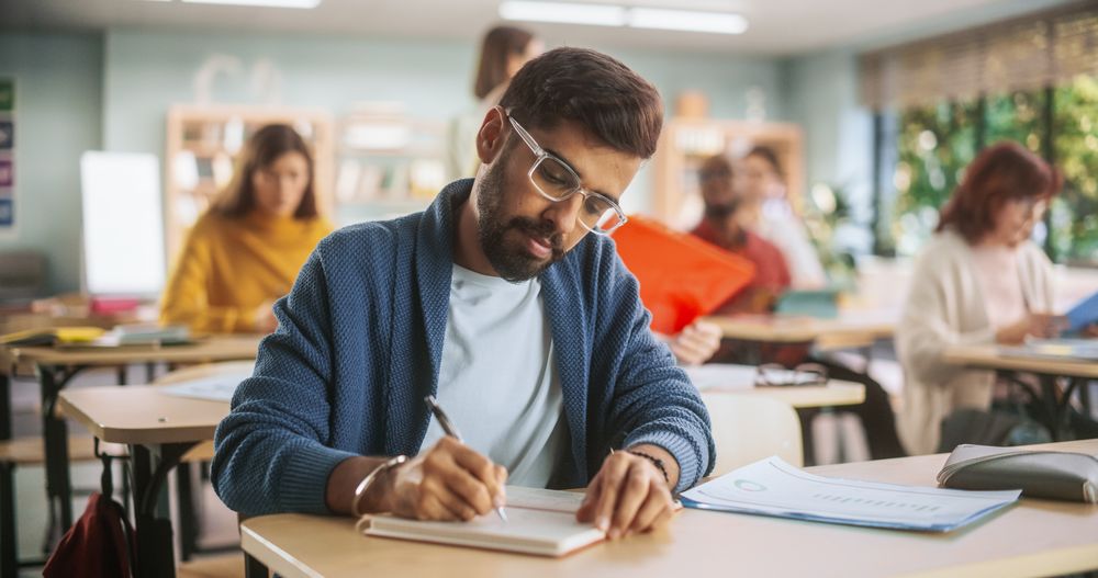 Portrait of a Indian Student Taking a Course in an International Adult Education Center.