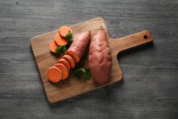 Concept of vegetables, sweet potato, top view