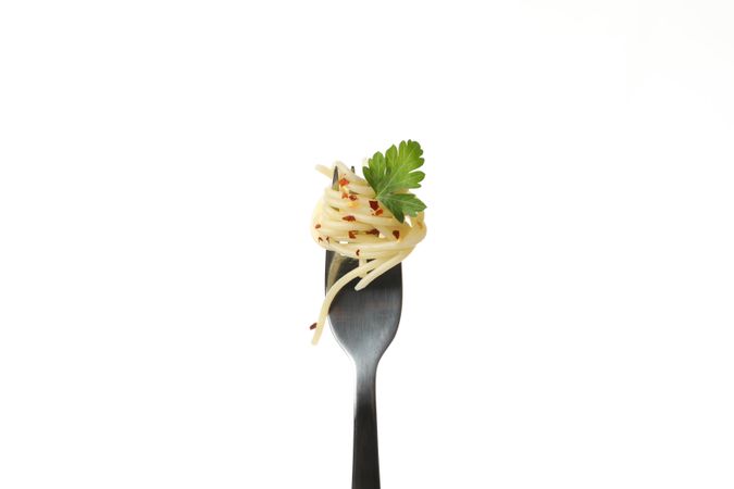 Fork with tasty pasta isolated on blank background