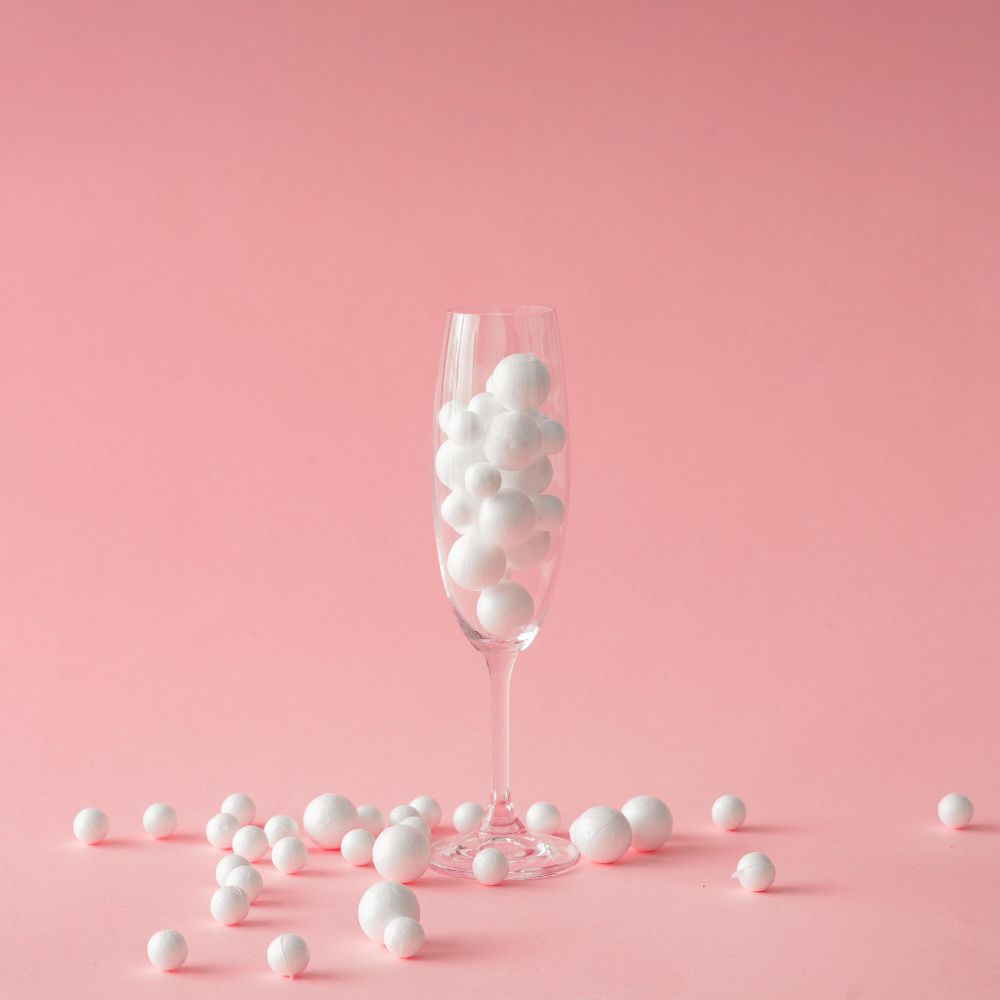 Champagne glass with light bubbles
