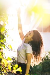 Cheerful woman in garden