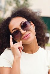 Portrait of Black female in sunglasses