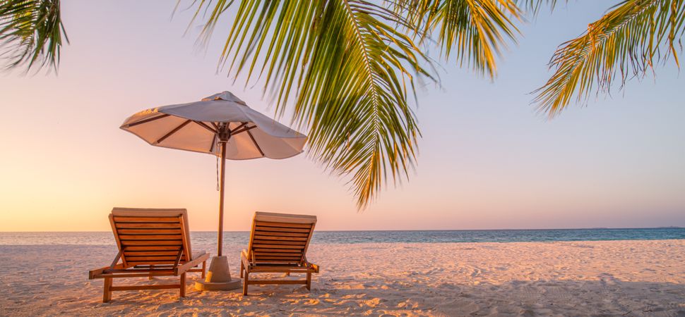Lounge chairs on an idyllic beach