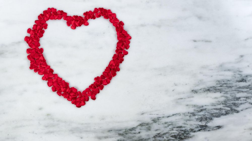 Red Large outline of heart for the Valentine’s day holiday on marble stone
