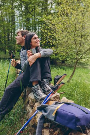Couple pausing while doing trekking