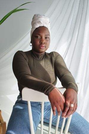 Pensive Black woman in turban