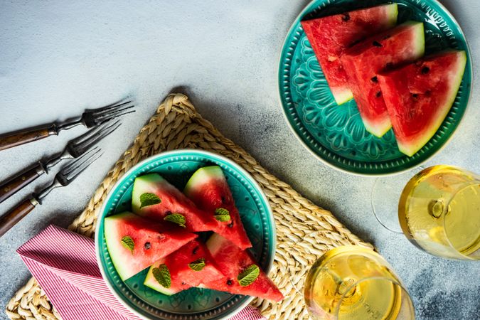 Top view of watermelon served with glasses of wine