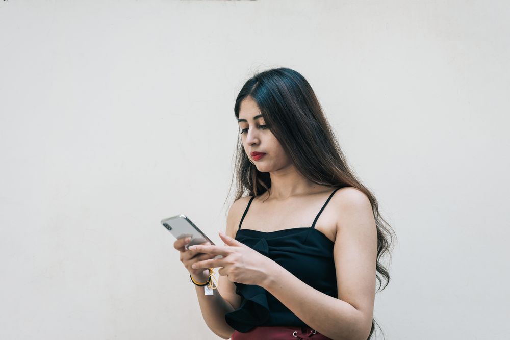 Woman holding cellphone