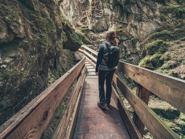 Woman admiring picturesque view of Alps