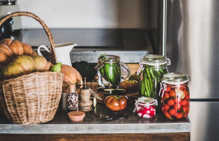 Rustic kitchen with pickled vegetables on counter
