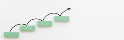 Arrow bouncing up off green block