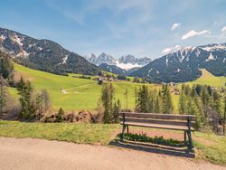 Small beautiful village between mountains with snow