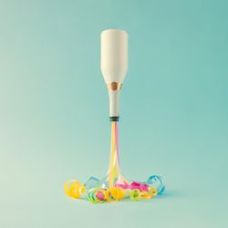 Champagne bottle with party streamers