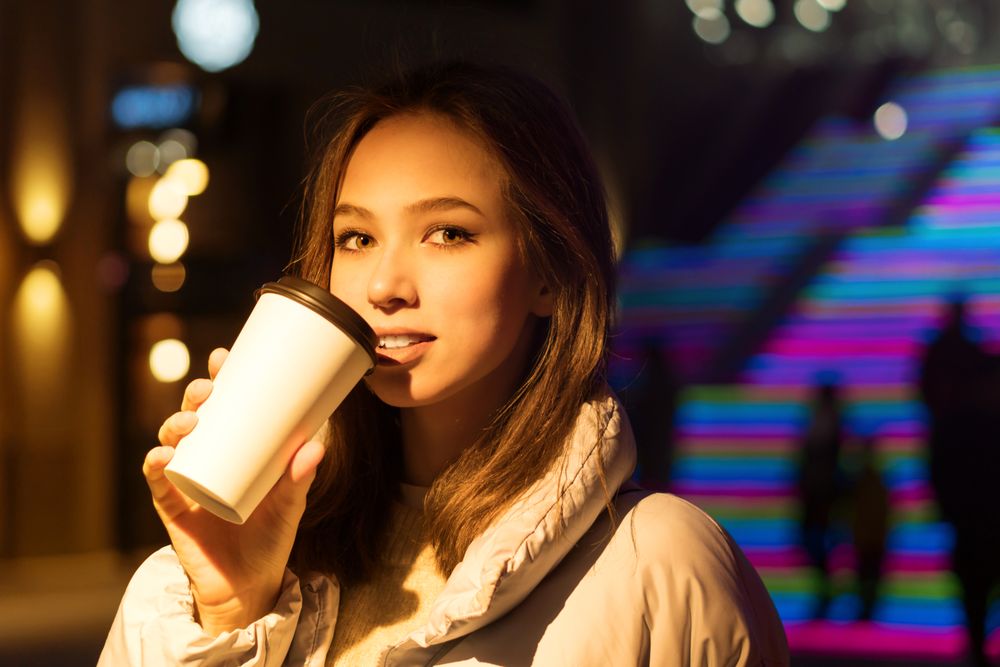 Woman enjoying nightlife in city