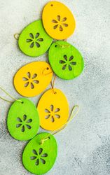 Easter holiday concept with colorful flat egg decorations