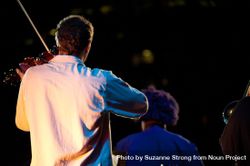 Los Angeles, CA, USA - July 12, 2012: Backshot of Miguel Atwood-Fergusonn playing violin 0y7JR4