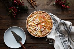tasty apple pie on a wooden table ready to eat