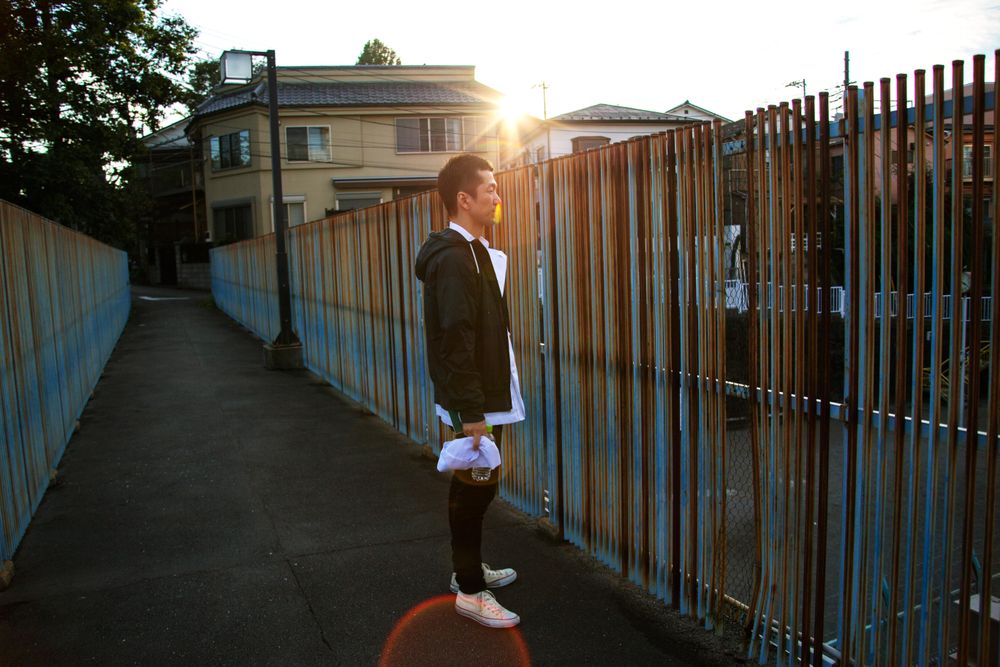 Man wearing sports jacket outdoor in the city