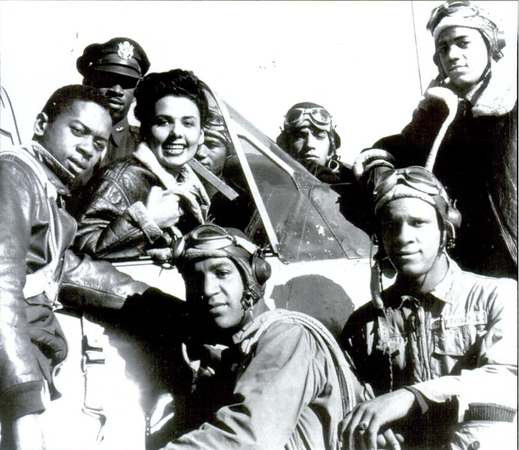 Members of the Tuskegee Airmen pose with Lena Horne