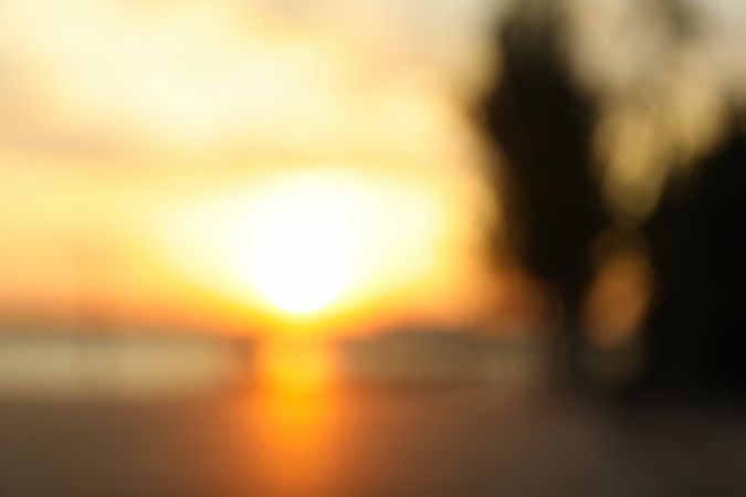 Blurred photo of amazing sunset. Amazing summer sunset