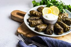 Traditional georgian dolma dish with dip