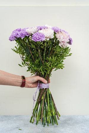 Pale purple flowers in bouquet