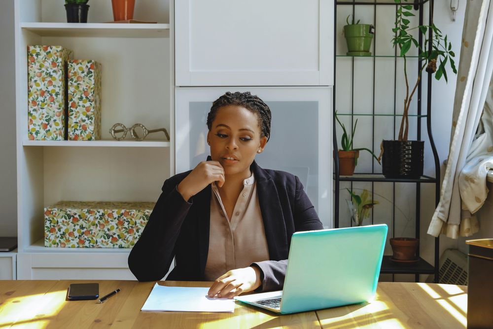 Small business owner working in her home office