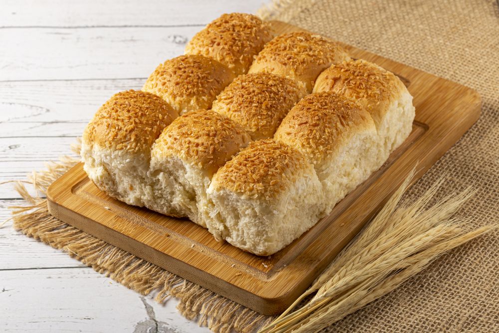 Coconut bread on the wooden table.