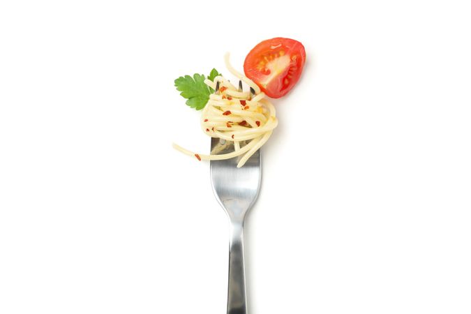 Fork with tasty pasta isolated on blank background