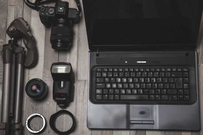 Photography equipment placed near laptop