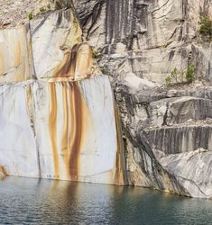 Calm water near stone quarry