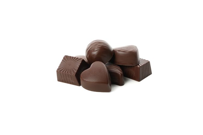 Tasty chocolate candies isolated on plain background