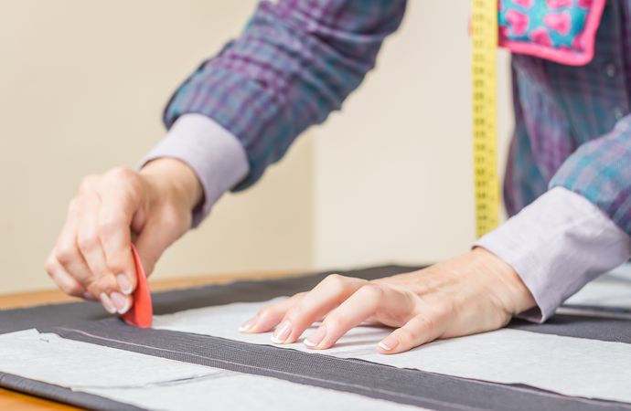 Dressmaker design tailor pattern on the table