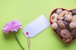 Blank label with a flower and chocolates for a gift
