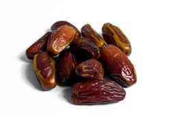 Close up fruits dates on isolated blank background