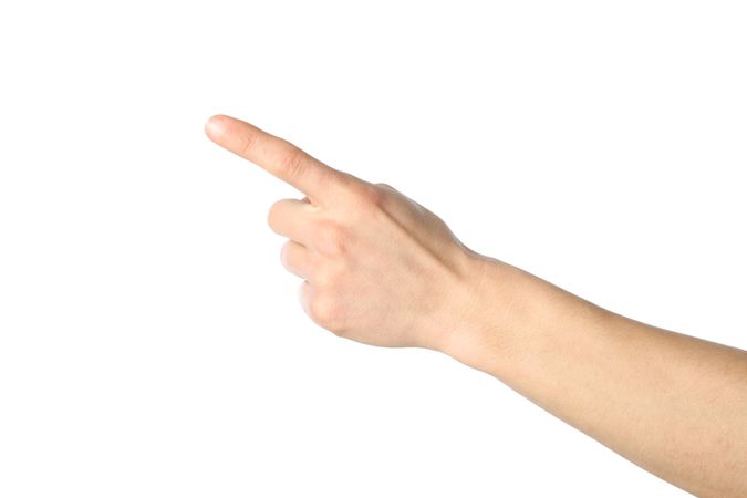 Male hand points, isolated on plain background. Gestures