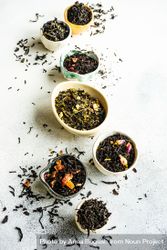 Loose leaf tea varieties on marble background 4AY684