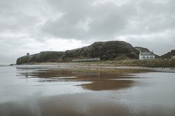 Old temple located on cliff in Northern Ireland coast