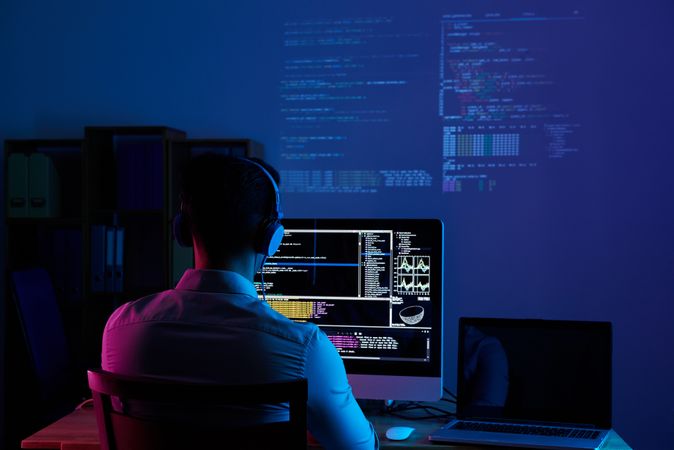 Back of person working on computer
