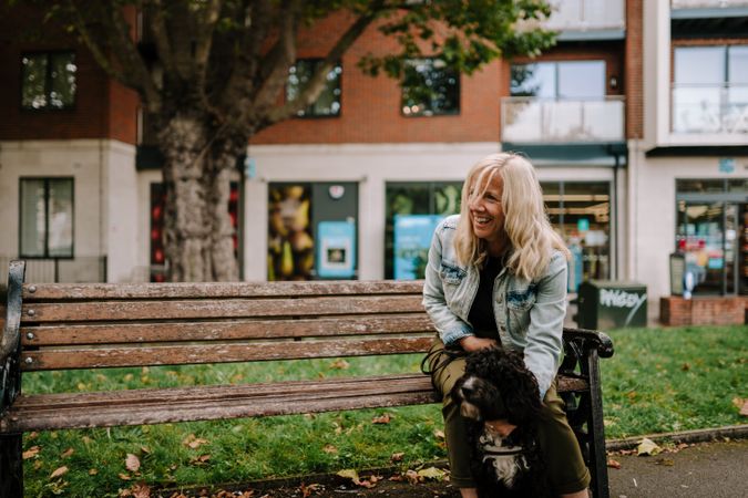 Woman on bench in city