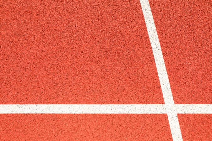 Red running track with lines outdoor, copy space